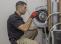 Strange ac making your conditioner air noises sounds home reasons repairman unit call when